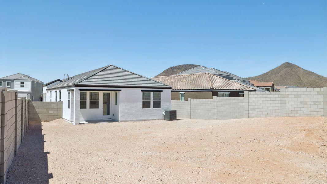 Exterior details and patio area of a home in The Buttes at Mystic, Peoria (Image 24).