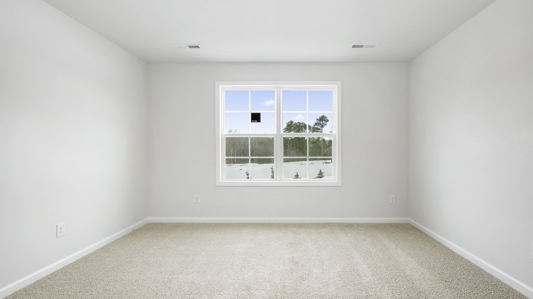 Spacious, unfurnished interior of a new home in The Meadows at Kinsley, Jamestown (Image 17). Spacious, unfurnished interior of a new home in The Meadows at Kinsley, Jamestown (Image 17).