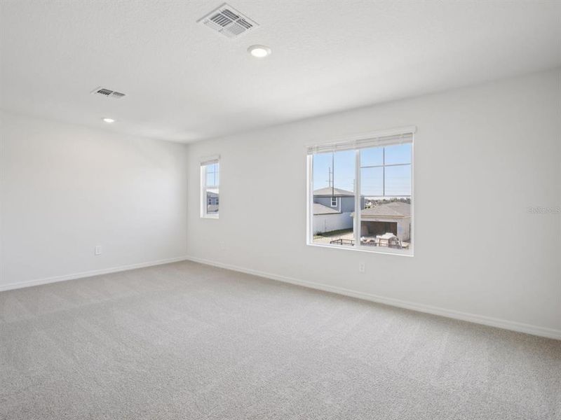 Spacious, unfurnished interior of a new home in Oakfield Trails - Premier Series, Parrish (Image 8).