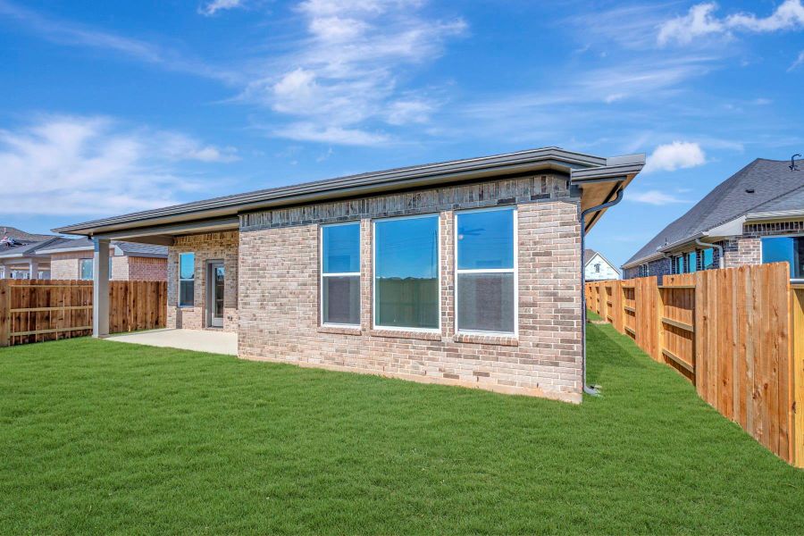 Exterior details and patio area of a home in The Grand Prairie 50’, Hockley (Image 3).