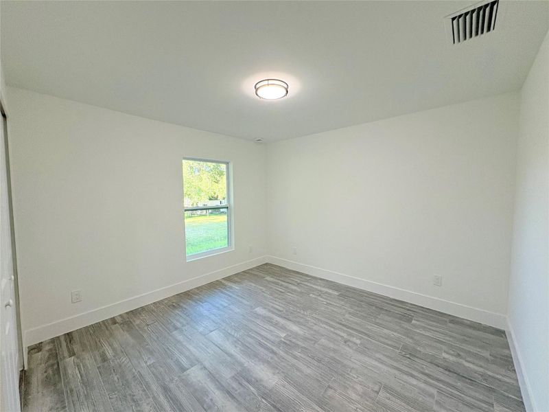 Spacious, unfurnished interior of a new home in , Okeechobee (Image 30).