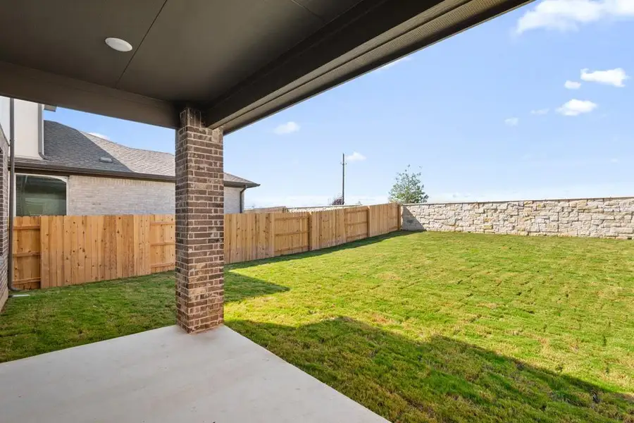 Exterior details and patio area of a home in Flora, Hutto (Image 2).