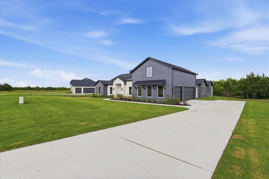 Front exterior of a new home in , Waxahachie, TX, highlighting curb appeal (Image 25).