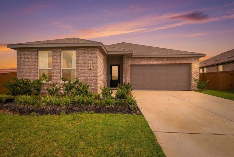 Front exterior of a new home in Emberly, Beasley, TX, highlighting curb appeal (Image 19). Front exterior of a new home in Emberly, Beasley, TX, highlighting curb appeal (Image 19).