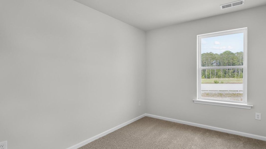 Spacious, unfurnished interior of a new home in Townes at Seabrooke, Leland (Image 22).