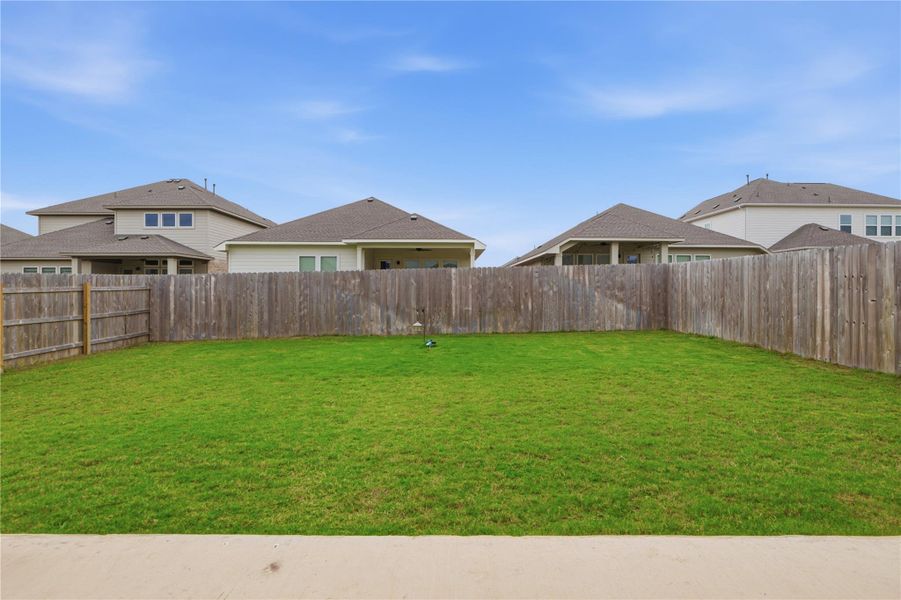 Exterior details and patio area of a home in University Heights, Round Rock (Image 22).