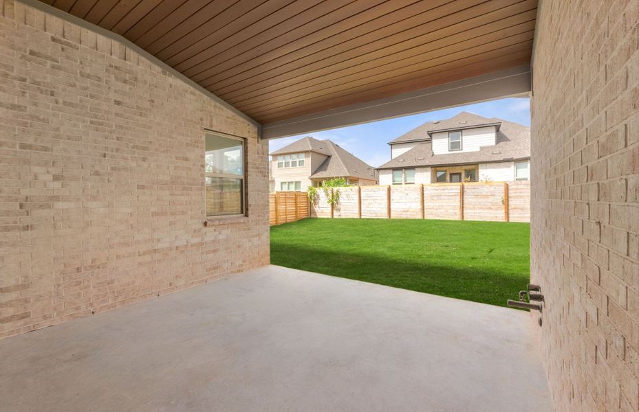 Exterior details and patio area of a home in Bluffview Reserve, Leander (Image 26).