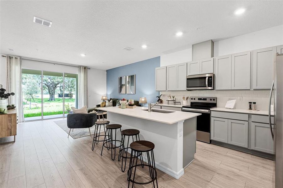 Furnished interior view inside a new home in Nona West, Orlando (Image 3). Furnished interior view inside a new home in Nona West, Orlando (Image 3).
