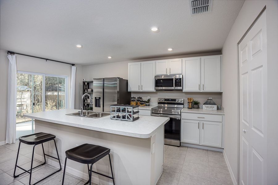 Furnished interior view inside a new home in Royal Highlands, Brooksville (Image 4). Furnished interior view inside a new home in Royal Highlands, Brooksville (Image 4).