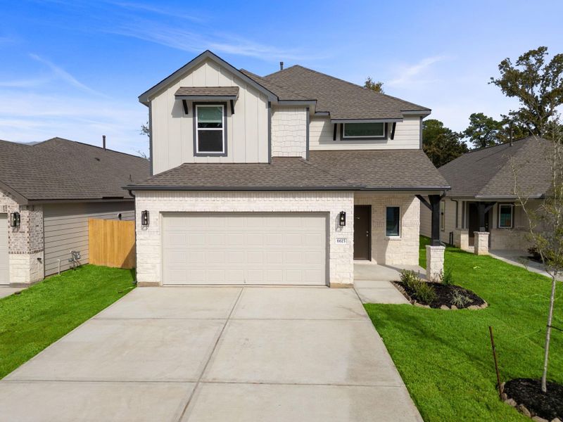 Front exterior of a new home in Cypresswood Landing, Humble, TX, highlighting curb appeal (Image 12). Front exterior of a new home in Cypresswood Landing, Humble, TX, highlighting curb appeal (Image 12).