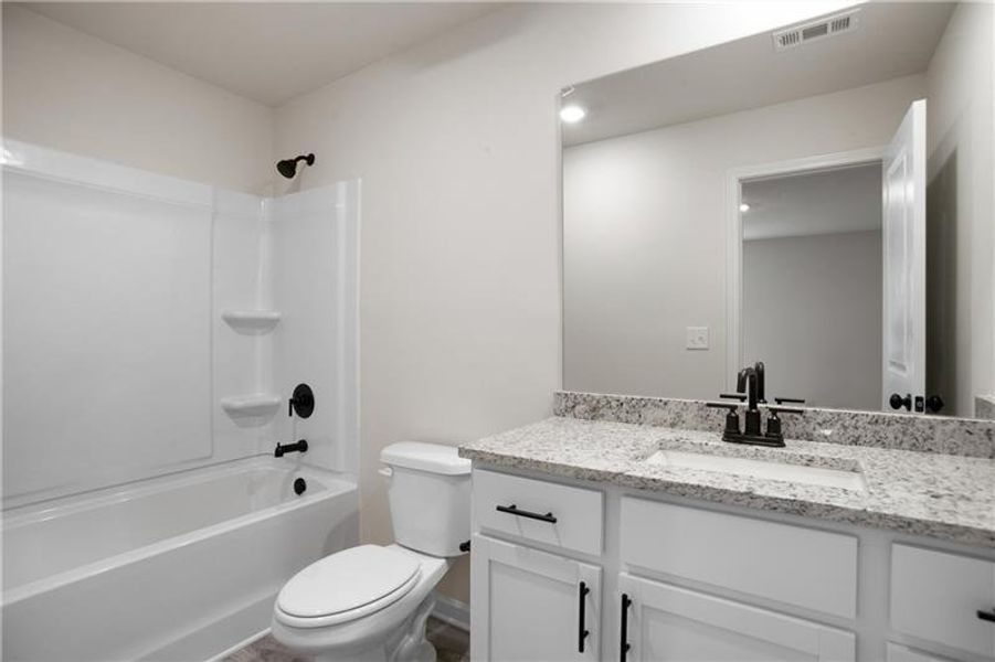 Furnished interior view inside a new home in , Buford (Image 13).