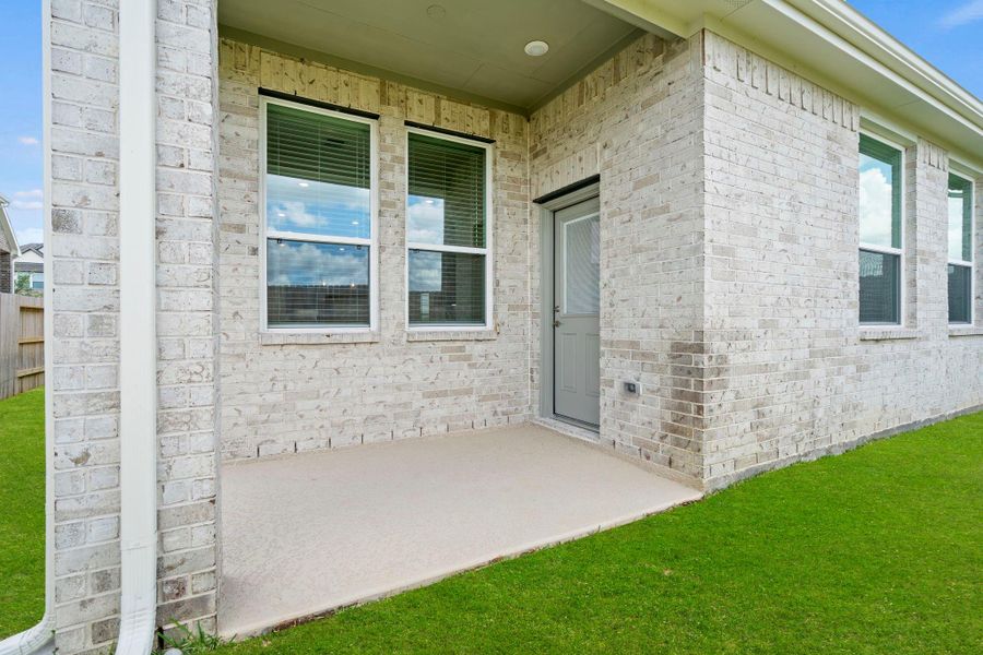 Exterior details and patio area of a home in Sunterra, Katy (Image 1). Exterior details and patio area of a home in Sunterra, Katy (Image 1).