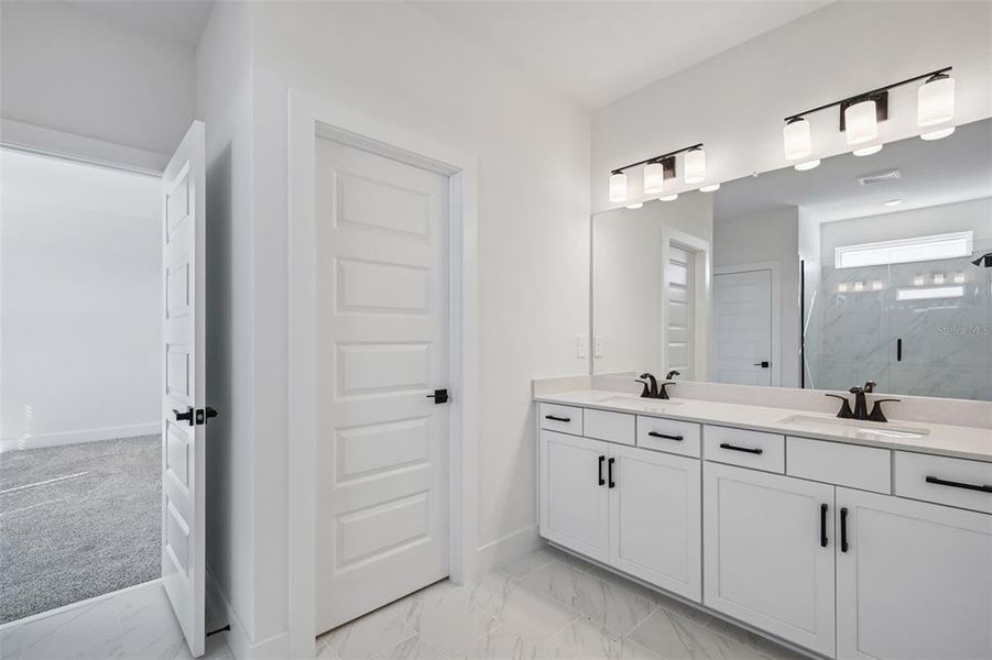 Furnished interior view inside a new home in Magnolia Bay - Reserve Series, Nokomis (Image 10). Furnished interior view inside a new home in Magnolia Bay - Reserve Series, Nokomis (Image 10).