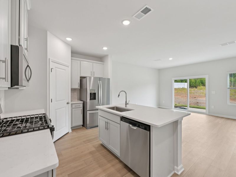 Furnished interior view inside a new home in Oakwood Townes, Mebane (Image 4).