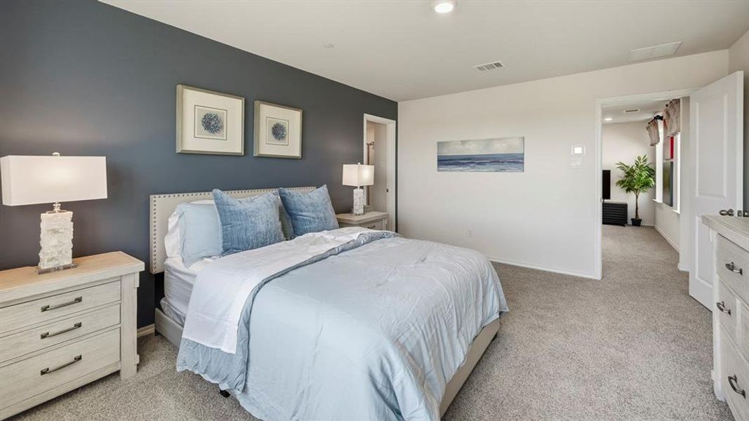 Bedroom featuring light colored carpet and recessed lighting Bedroom featuring light colored carpet and recessed lighting
