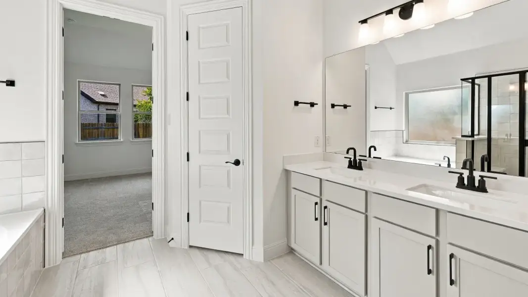 Furnished interior view inside a new home in Oaks at San Gabriel, Georgetown (Image 23).