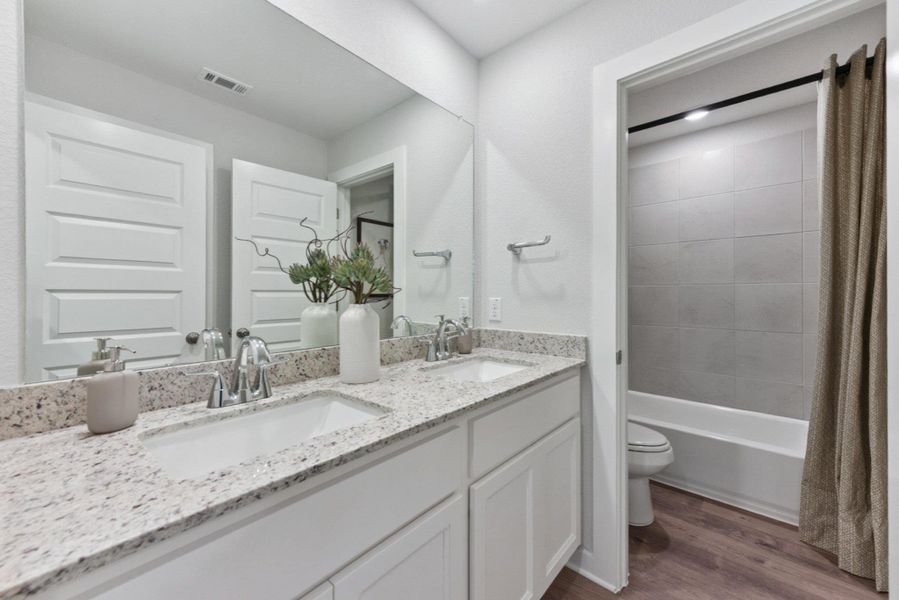 Furnished interior view inside a new home in The Ridge at Trinity Ranch, Elgin (Image 3).