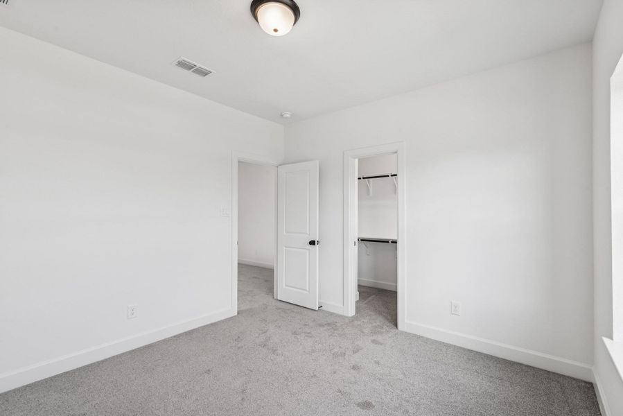 Spacious, unfurnished interior of a new home in The Meadows at Imperial Oaks, Conroe (Image 26).