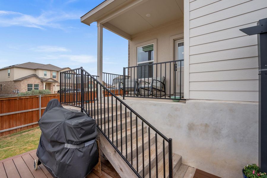 Exterior details and patio area of a home in Thunder Rock, Marble Falls (Image 22).