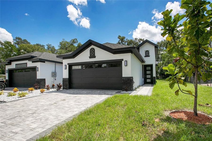 Front exterior of a new home in , Apopka, FL, highlighting curb appeal (Image 37).