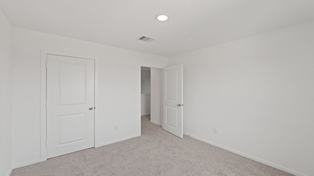 Representative unfurnished interior of a home built from the Davis by D.R. Horton in Lake Conroe Cove, Willis (Image 19).