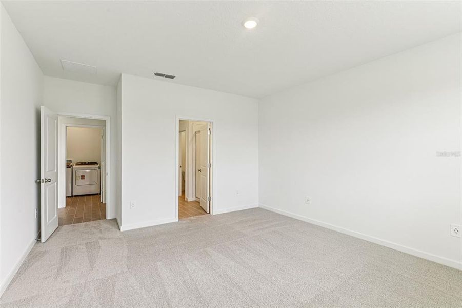 Spacious, unfurnished interior of a new home in Colbert Landings, Palm Coast (Image 15).