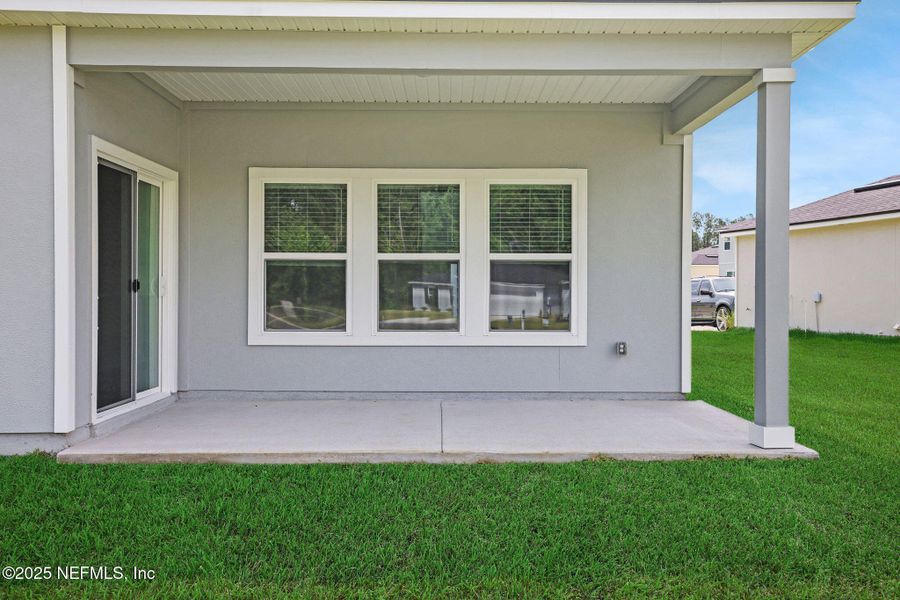 Exterior details and patio area of a home in , Green Cove Springs (Image 3). Exterior details and patio area of a home in , Green Cove Springs (Image 3).