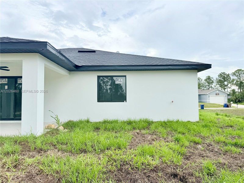 Exterior details and patio area of a home in , Lehigh Acres (Image 36).