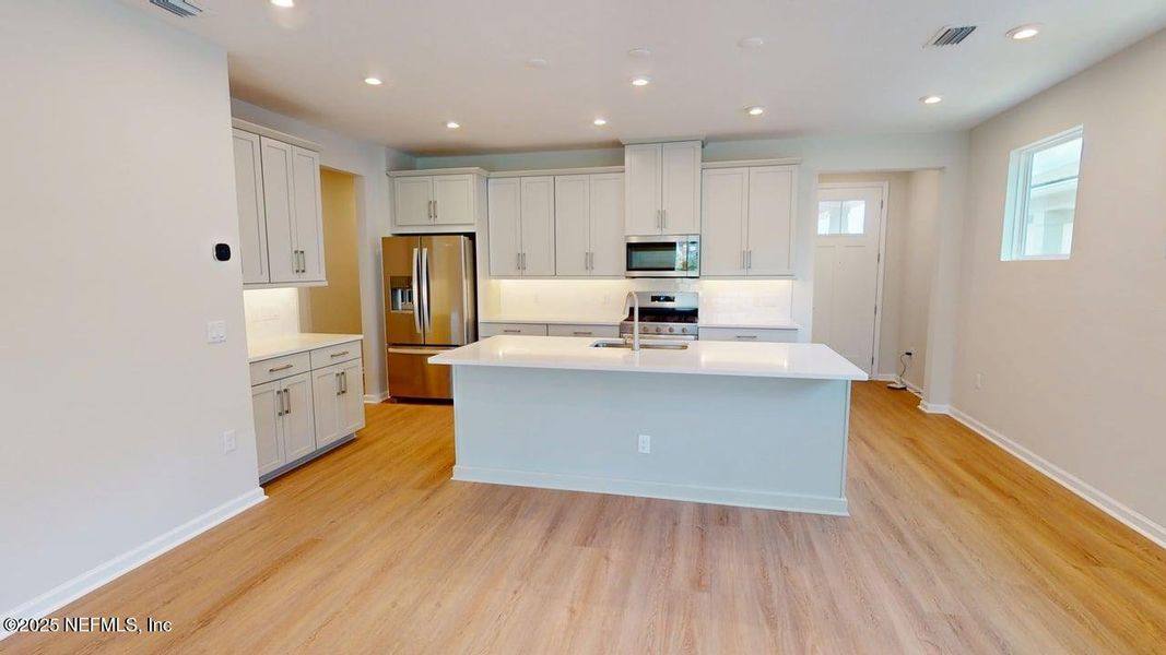 Furnished interior view inside a new home in RiverTown - WaterSong, St. Johns (Image 6). Furnished interior view inside a new home in RiverTown - WaterSong, St. Johns (Image 6).