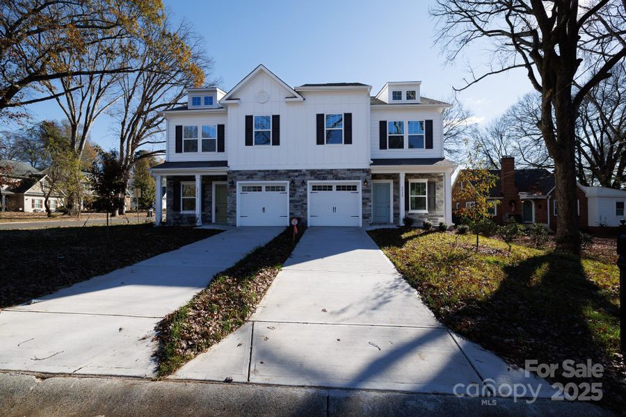 Front exterior of a new home in , Charlotte, NC, highlighting curb appeal (Image 22).