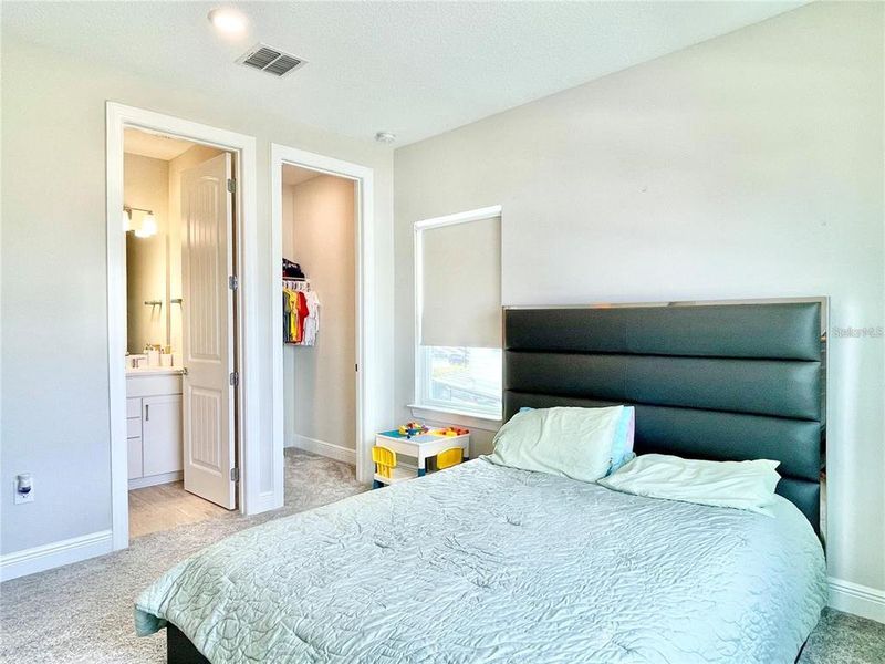 Furnished interior view inside a new home in Parkview Reserve, Orlando (Image 43).