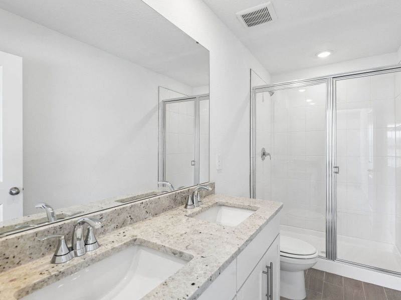 Furnished interior view inside a new home in The District at Oakleaf - The Commons, Middleburg (Image 8).