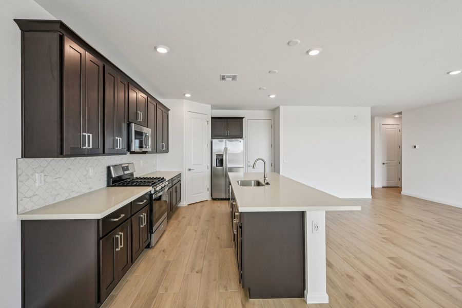 Kitchen featuring the Roosevelt Collection. Finishes and options may vary by community