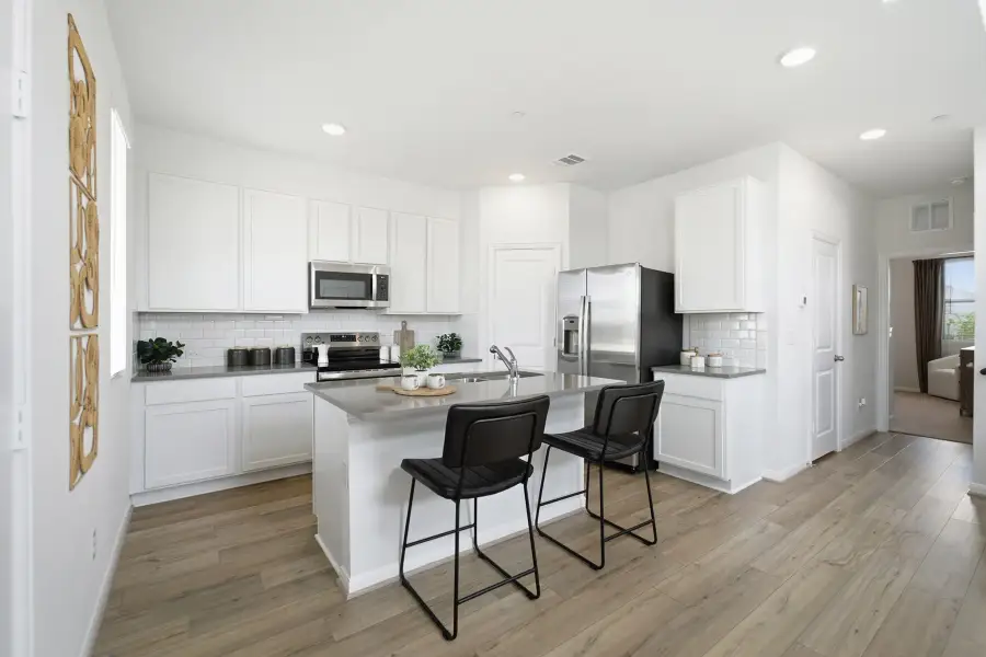 Furnished interior view inside a new home in Municipal Drive Townhomes, Leander (Image 6). Furnished interior view inside a new home in Municipal Drive Townhomes, Leander (Image 6).