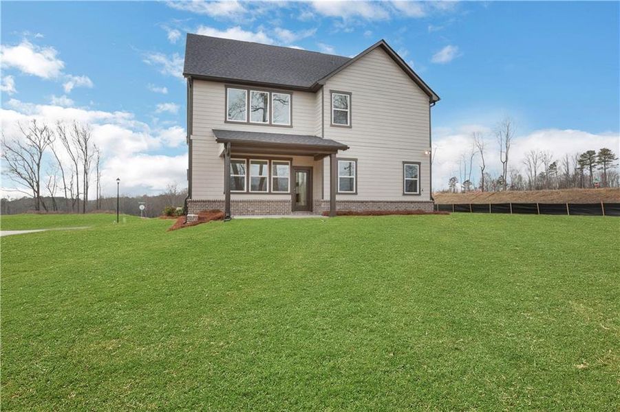 Exterior details and patio area of a home in Acacia, Cumming (Image 27).