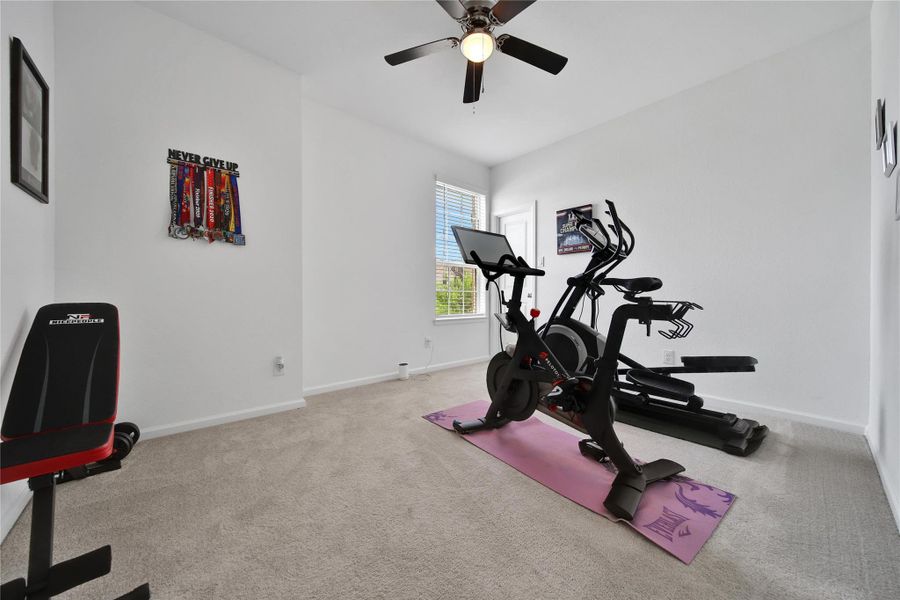 This split plan host two secondary bedrooms to left of the front door currently, this room is used as a home gym