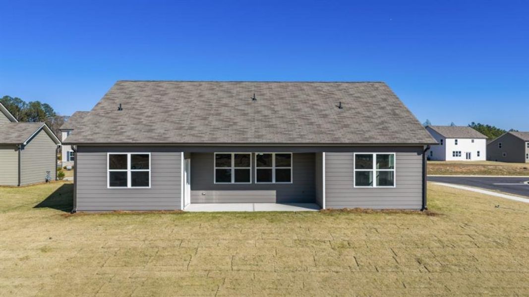 Exterior details and patio area of a home in Fairway 17 at Mirror Lake, Villa Rica (Image 23).