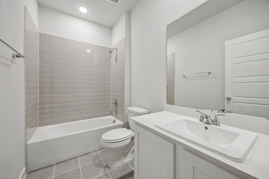 Bathroom in the Haylee home plan by Trophy Signature Homes - REPRESENTATIVE PHOTO Bathroom in the Haylee home plan by Trophy Signature Homes - REPRESENTATIVE PHOTO