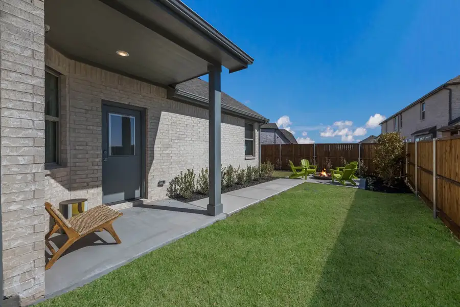 Exterior details and patio area of a home in Heartland, Heartland (Image 4).