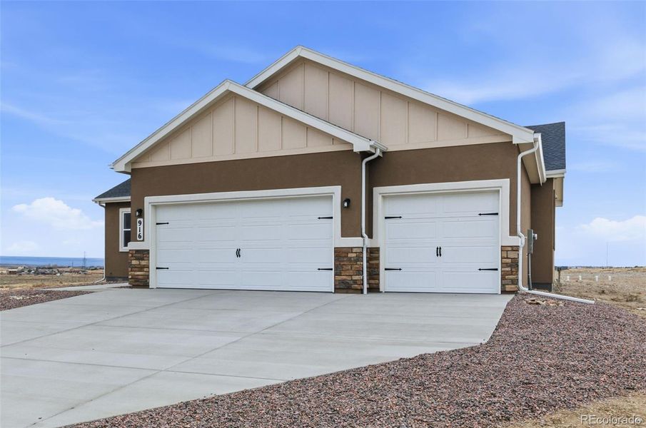Front exterior of a new home in , Pueblo, CO, highlighting curb appeal (Image 1). Front exterior of a new home in , Pueblo, CO, highlighting curb appeal (Image 1).