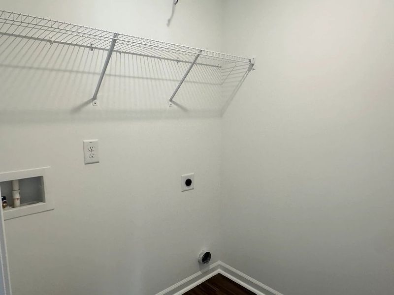 Laundry Room - Functional with flair, featuring sleek shelving. Laundry Room - Functional with flair, featuring sleek shelving.