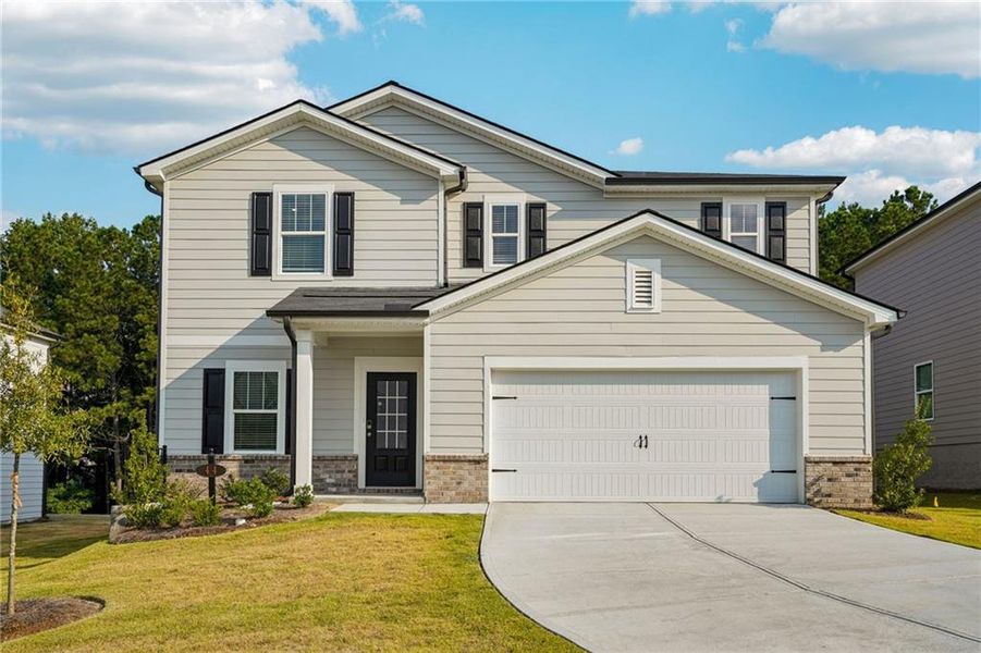 Front exterior of a new home in Ivey Township, Dallas, GA, highlighting curb appeal (Image 1). Front exterior of a new home in Ivey Township, Dallas, GA, highlighting curb appeal (Image 1).
