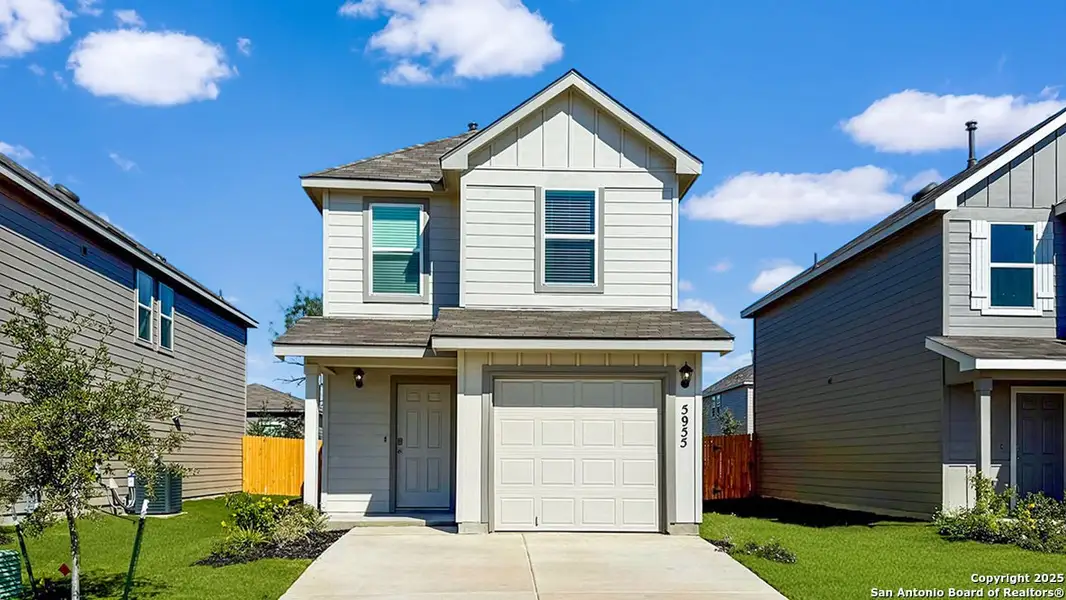 Front exterior of a new home in Blue Ridge Ranch, San Antonio, TX, highlighting curb appeal (Image 1). Front exterior of a new home in Blue Ridge Ranch, San Antonio, TX, highlighting curb appeal (Image 1).