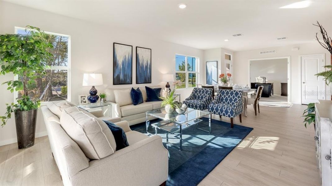 Furnished interior view inside a new home in Cove at West Port - Express, Port Charlotte (Image 14).
