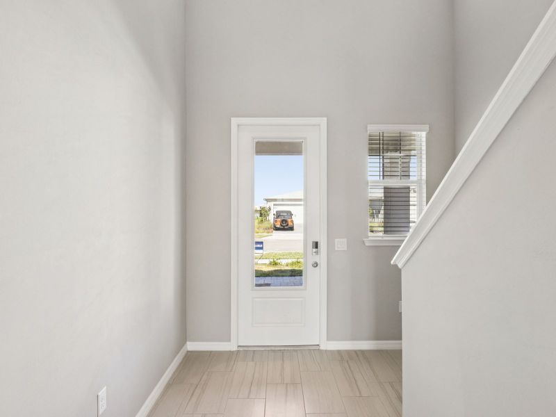 Spacious, unfurnished interior of a new home in Crescent Lakes - Premier Series, Punta Gorda (Image 11).