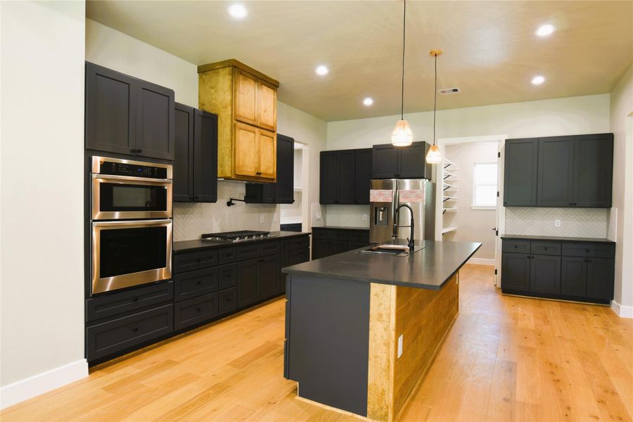 Furnished interior view inside a new home in , Conroe (Image 4).