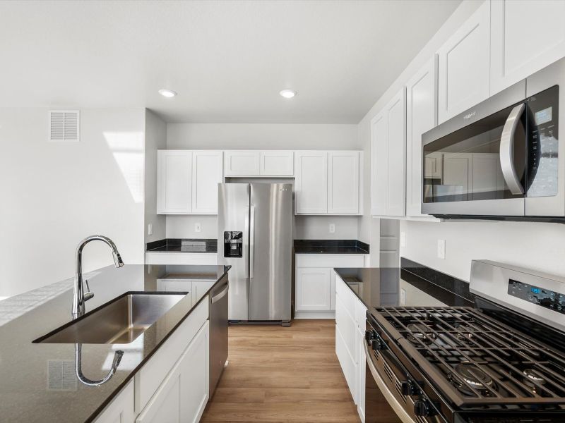 Furnished interior view inside a new home in Poudre Heights: The Lakes Collection, Windsor (Image 3).