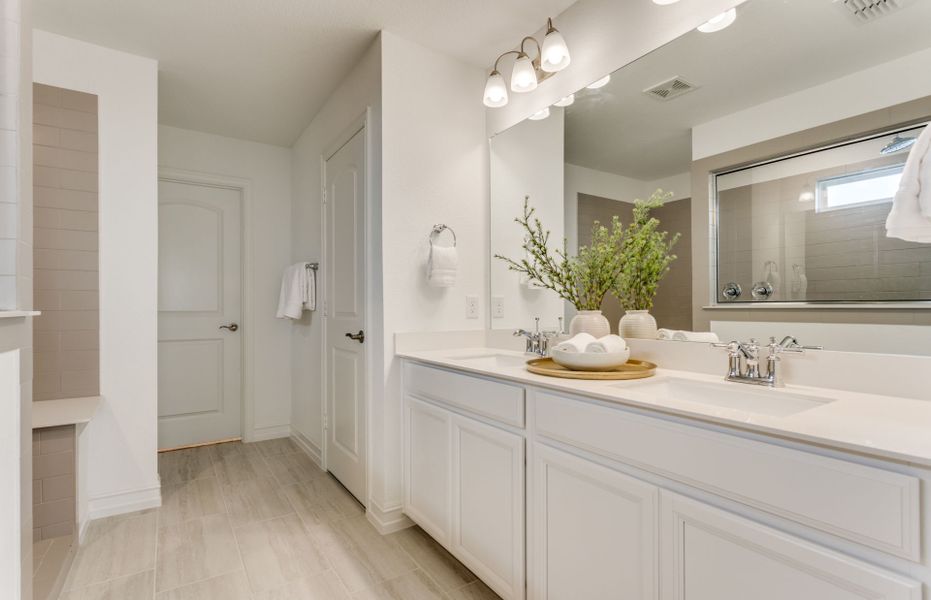 Owner's private bath with double vanity