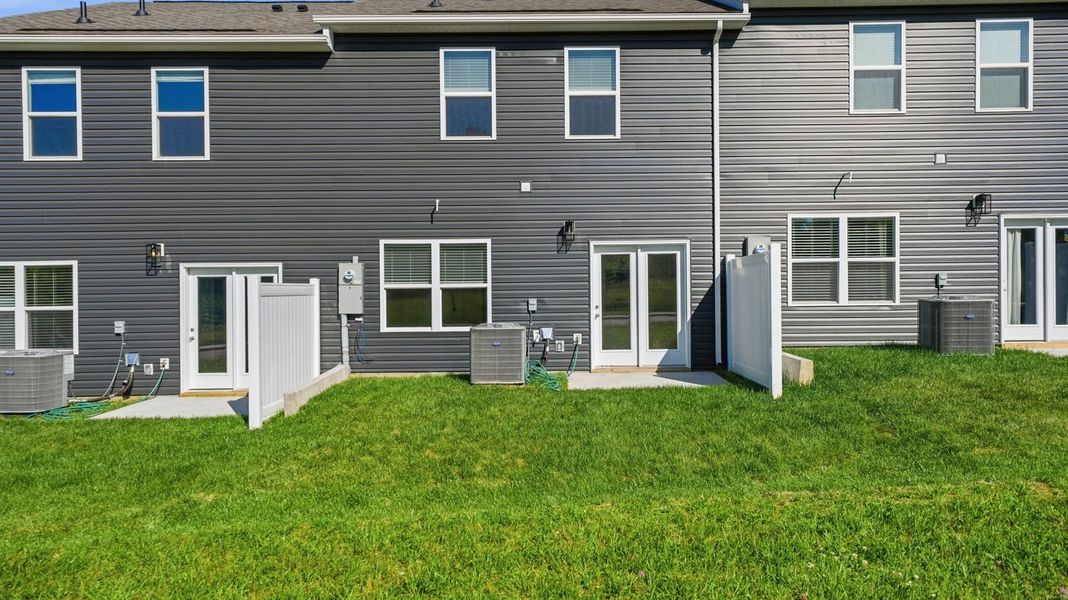 Exterior details and patio area of a home in The Arbor Townhomes, Kingsport (Image 17). Exterior details and patio area of a home in The Arbor Townhomes, Kingsport (Image 17).