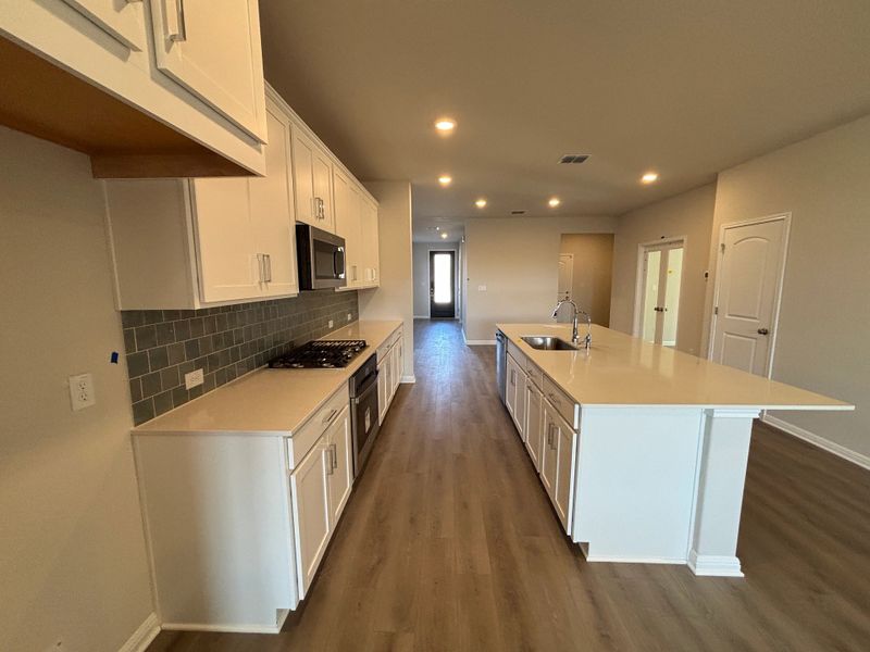 Furnished interior view inside a new home in Cannon Ranch 40s, Dripping Springs (Image 6).